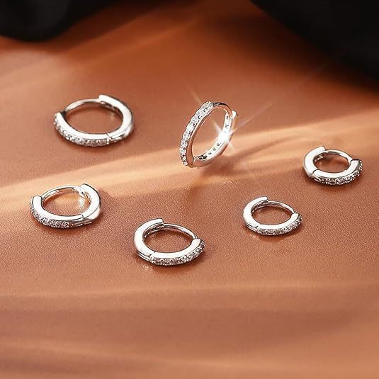 Damen Ohrstecker mit funkelnden Zirkonia-Akzenten und elegantem Design Shop Nory
