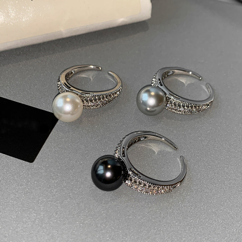 Damenring mit elegantem Perlencap und funkelnden Zirkonia Shop Nory