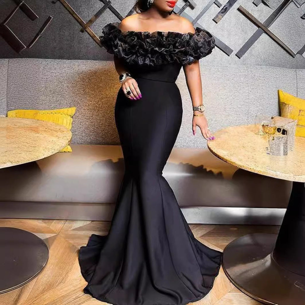 Damen Abendkleid mit voluminösem Rüschensaum