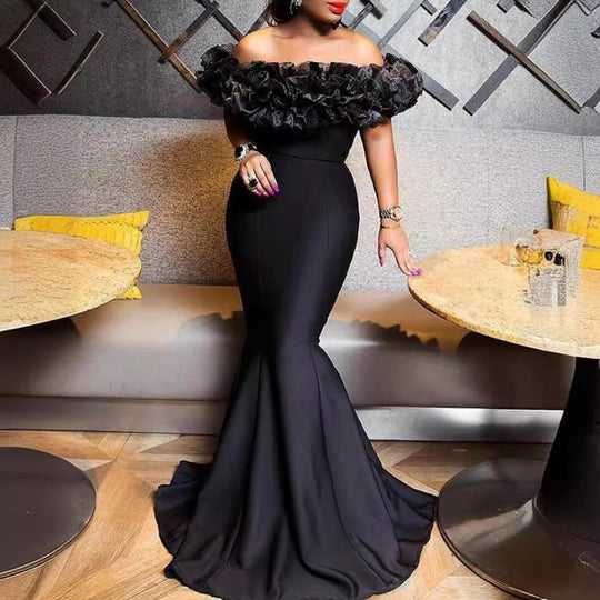 Damen Abendkleid mit voluminösem Rüschensaum
