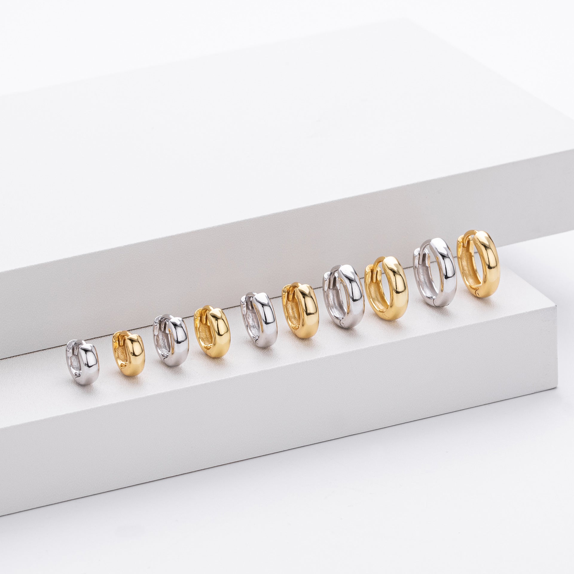 Damen Creolen mit modernem, geschwungenem Design aus hochwertigem 925 Sterling Silber Shop Nory