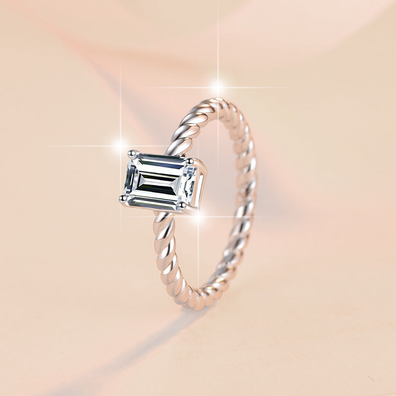 Damenring mit elegantem quadratischem Zirkonia und drehbarem Design Shop Nory