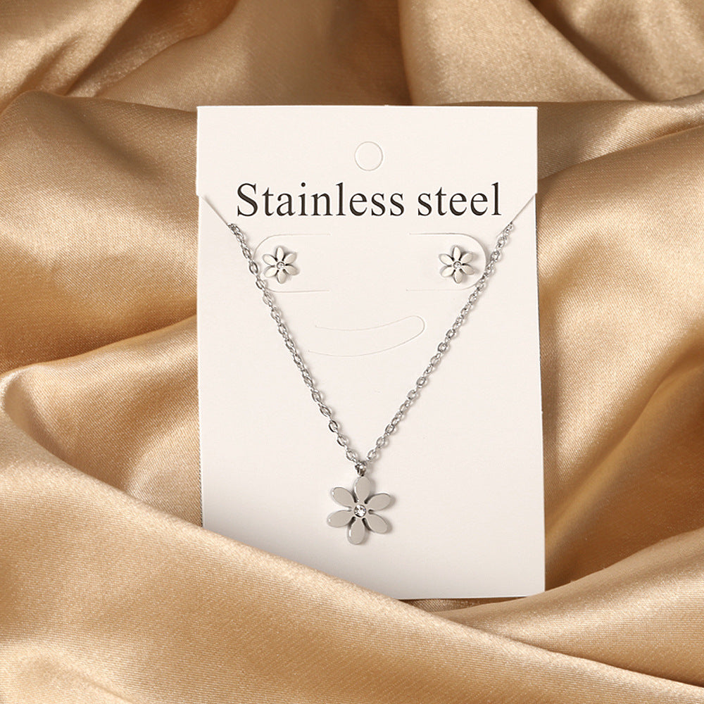 Damen Schmuckset mit elegantem Blumenanhänger und passenden Ohrsteckern Shop Nory