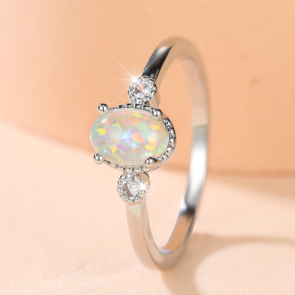 Damen Ring mit schimmerndem Opal und funkelnden Zirkonia Shop Nory