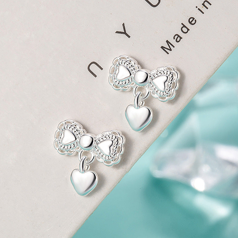 Damen Ohrstecker mit herzförmigem und filigranem Design Shop Nory