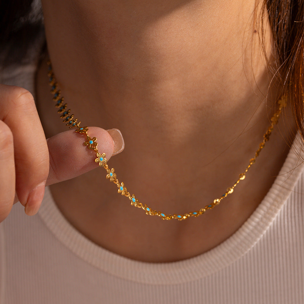 Damen Kette mit zarten Blumenelementen und hochwertiger Edelstahlverarbeitung Shop Nory