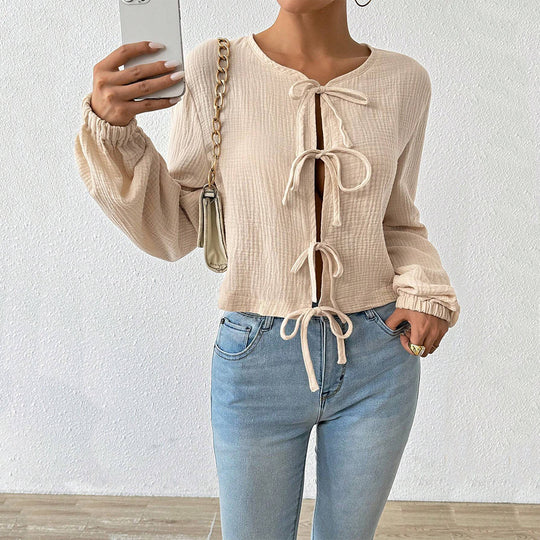 Damen kurz geschnittene Musselinbluse mit Knotenverschlüssen und Ballonärmeln Shop Nory