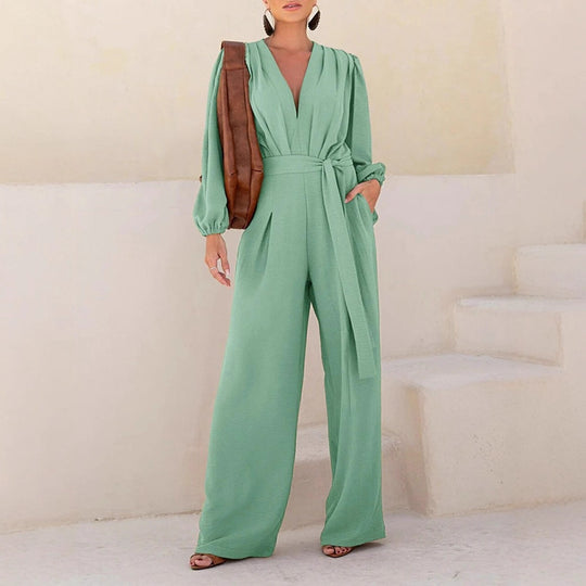 Damen Eleganter Palazzo-Jumpsuit mit tiefem V‑Ausschnitt, Bindegürtel und Ballonärmeln Shop Nory