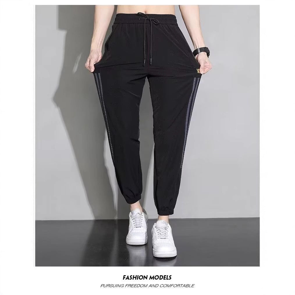 Damen Sportliche Trainingshose mit seitlichen Streifen Shop Nory