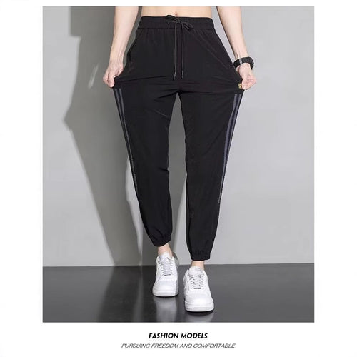 Damen Sportliche Trainingshose mit seitlichen Streifen Shop Nory