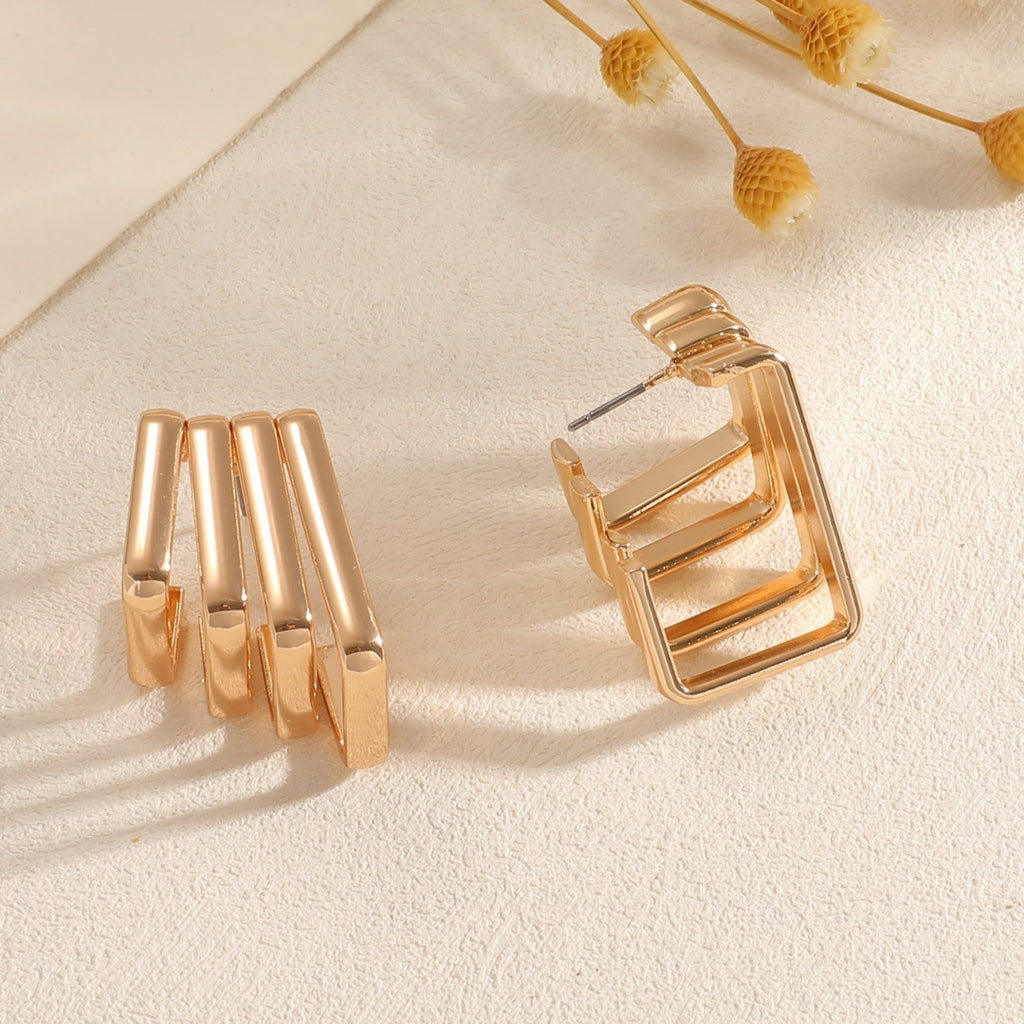 Damen Ohrringe mit modernem, skulpturalem Design Shop Nory