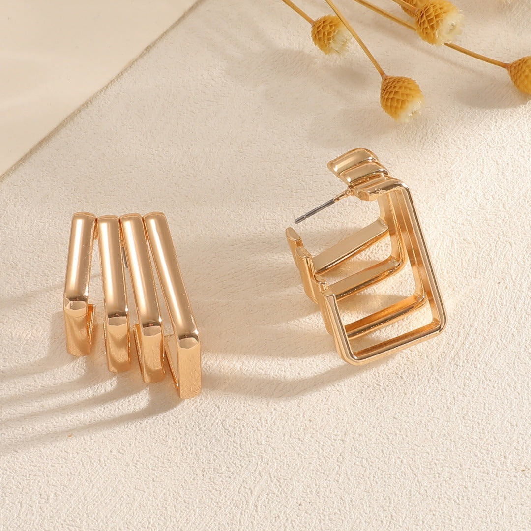 Damen Ohrringe mit modernem, skulpturalem Design Shop Nory