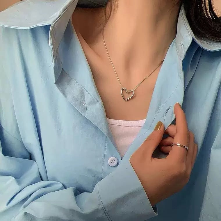 Damen Halskette mit verspieltem Herzanhänger und filigranem Design Shop Nory