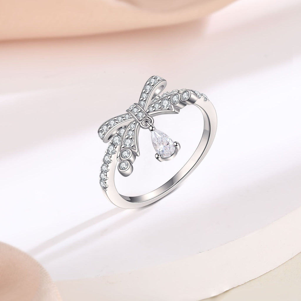 Damenring mit elegantem Schleifenmotiv und funkelnden Zirkonia-Steinen Shop Nory