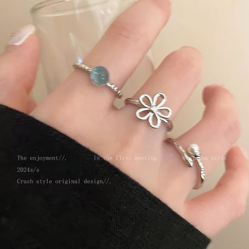 Damen Ring-Set mit filigranen Blütenmotiven und elegantem Edelsteindetail Shop Nory