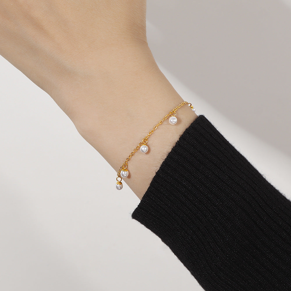 Damen zartes Perlenarmband mit goldfarbener Gliederkette Shop Nory
