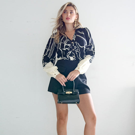 Damen V-Ausschnitt-Bluse mit abstraktem Grafikprint, Ballonärmeln und kontrastierenden Manschetten Shop Nory