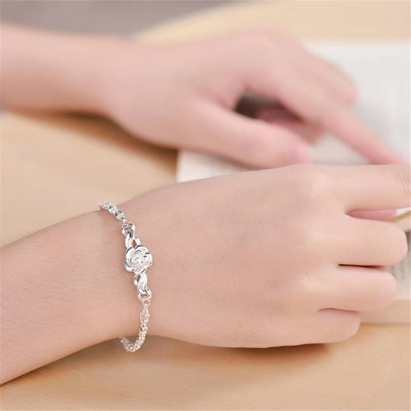 Damenarmband mit filigranem Blumendesign und elegantem Zirkonia-Besatz Shop Nory