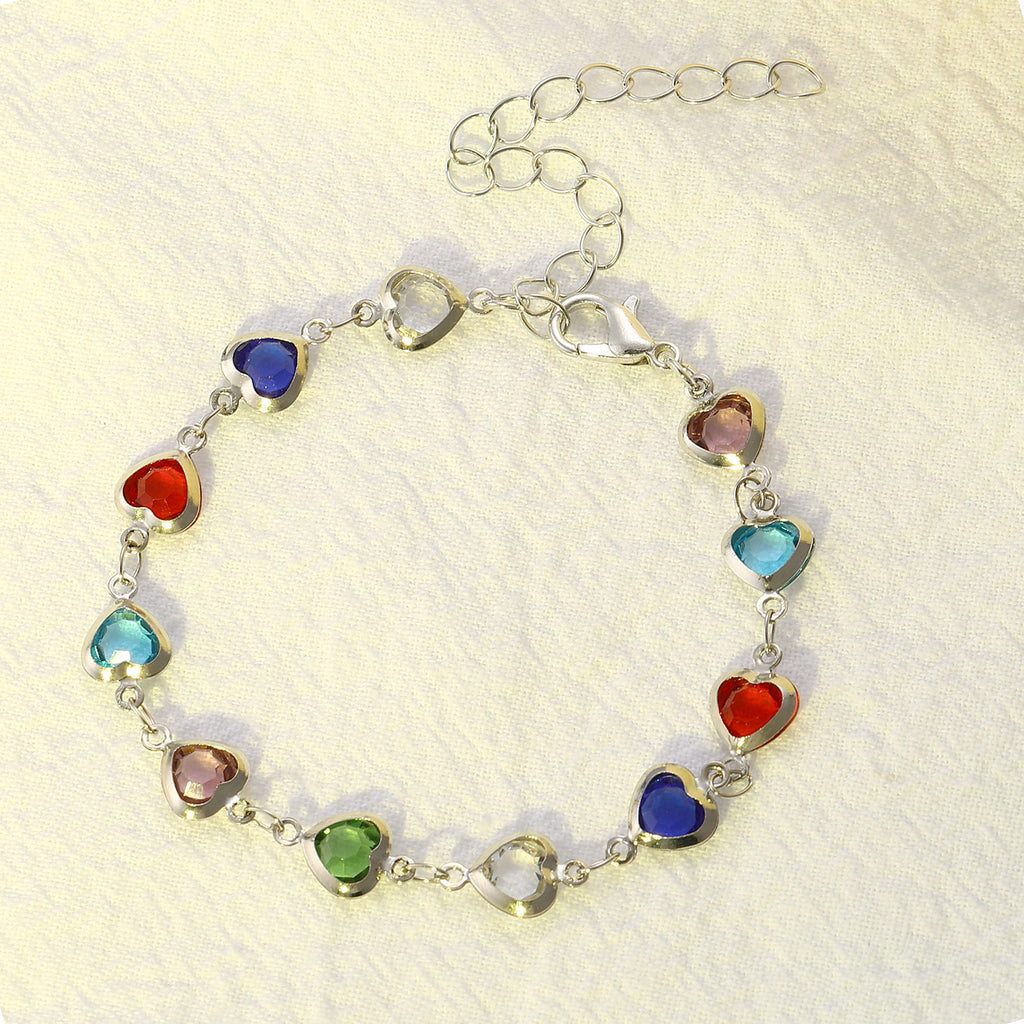 Damenarmband mit funkelnden Herzanhängern und hochwertigen Kristallen Shop Nory