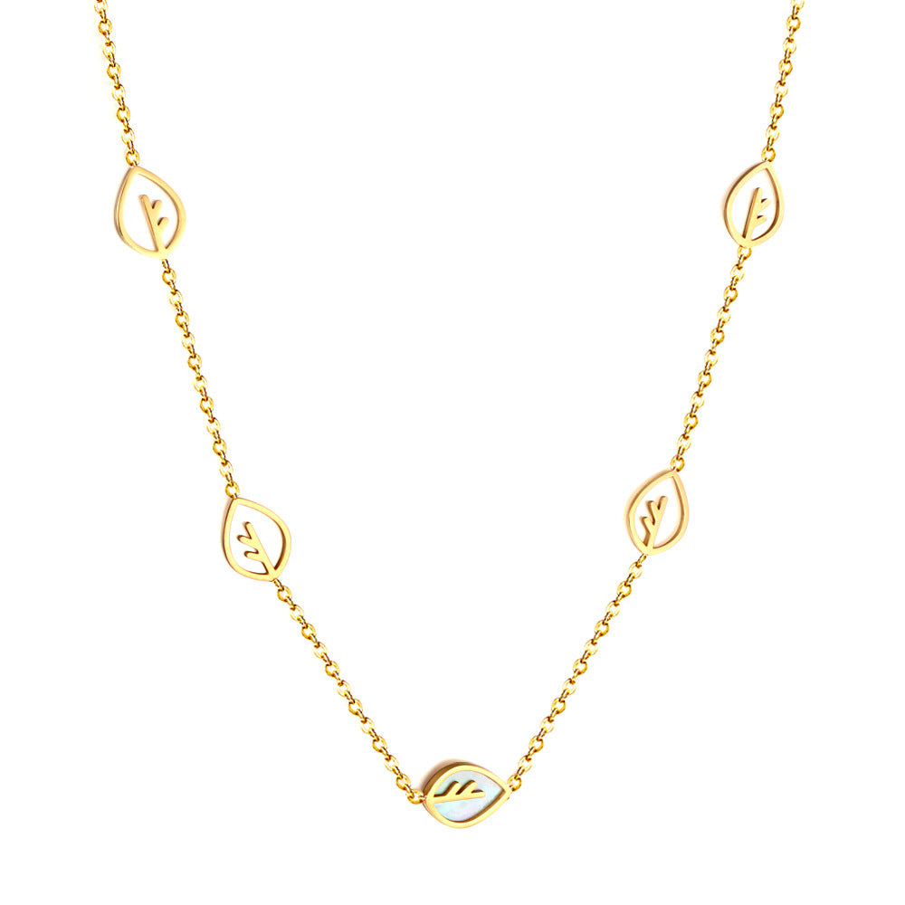 Damen Armband mit feinen Blattmotiven aus Edelstahl und goldplattierter Oberfläche Shop Nory
