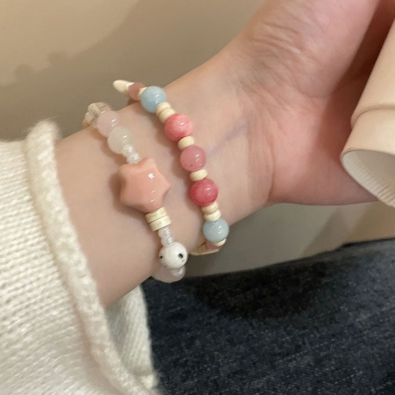 Damen Armband aus handgefertigten Natursteinen mit charmanten Tiermotiven Shop Nory