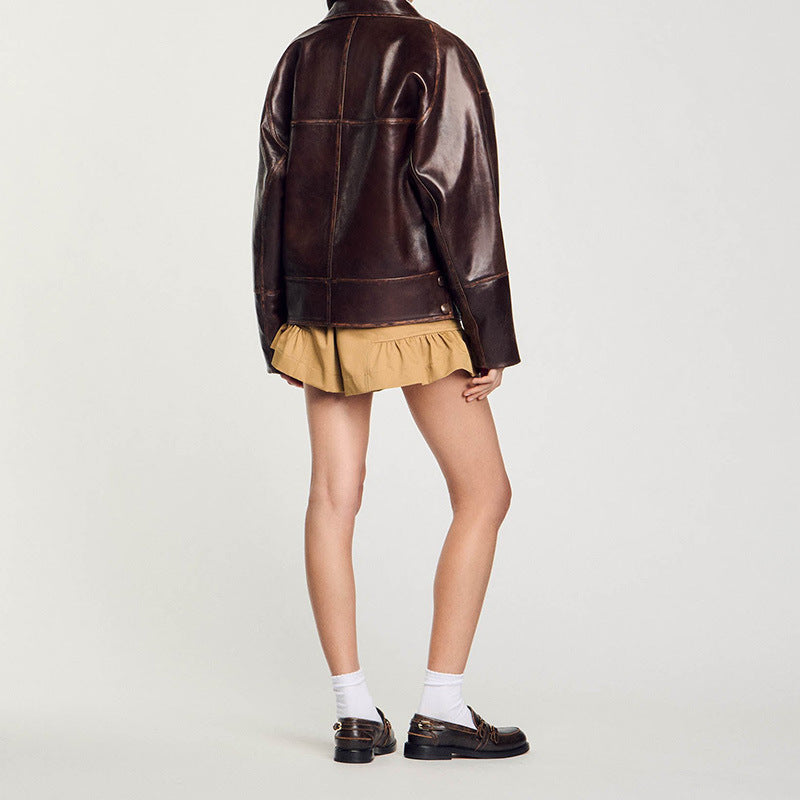 Damen Kurz geschnittene Oversize-Lederjacke mit Rundkragen und Pattentaschen Shop Nory