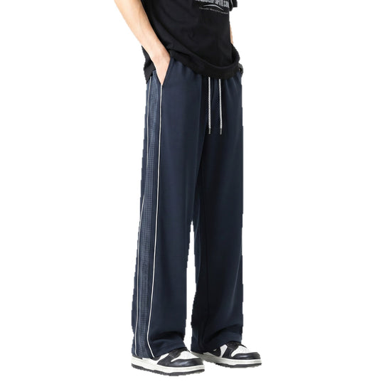 Herren Weite Trackhose im Oversize‑Schnitt mit Tunnelzug und seitlichem Karomuster‑Streifen Shop Nory