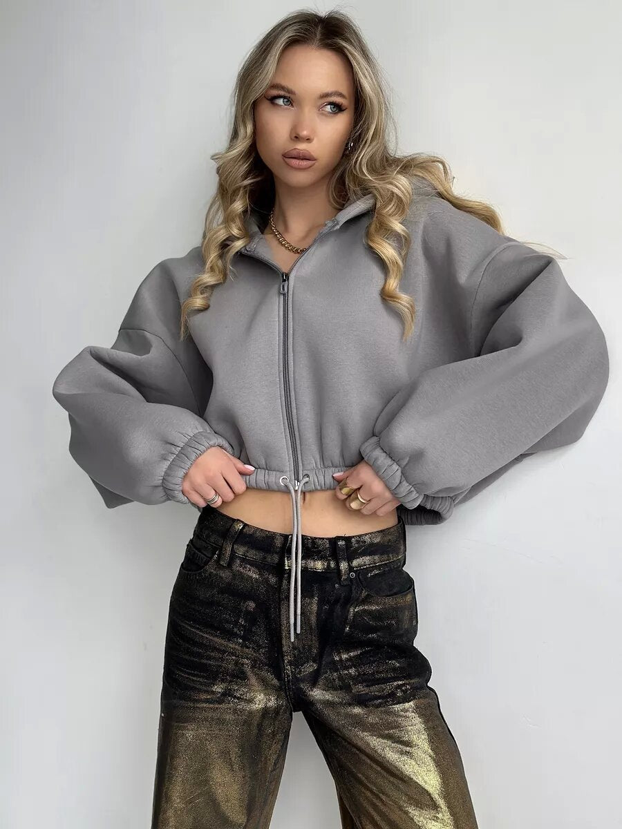 Damen kurze Kapuzenjacke mit Tunnelzugbund, Ballonärmeln und halbhohem Reißverschluss Shop Nory