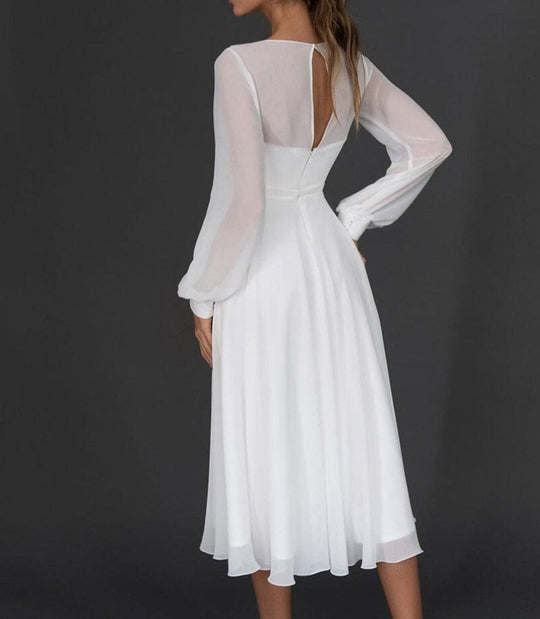 ShopNory Damen Midikleid mit Wickeloptik und transparenten Ärmeln