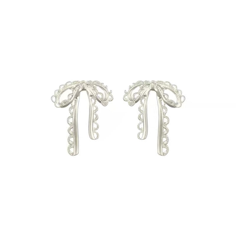 Damen Ohrringe mit filigranem Schleifen-Design Shop Nory