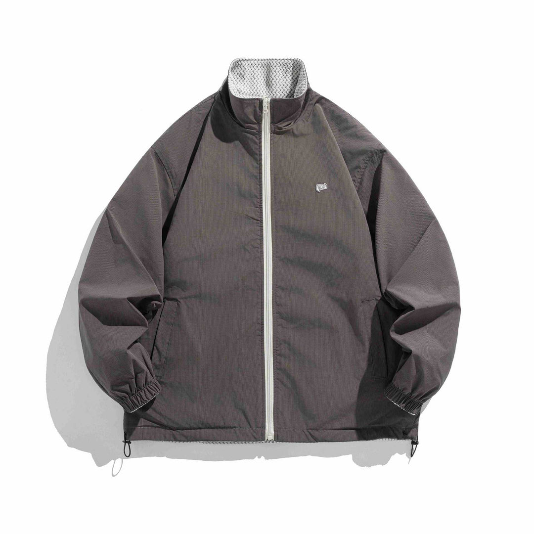 Unisex Struktur‑Fleecejacke mit hohem Stehkragen, Reißverschluss‑Taschen und Tunnelzugsaum Shop Nory