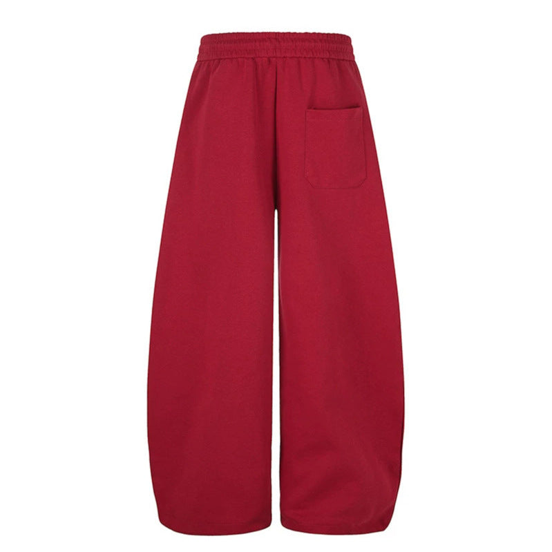 Damen Lockerfallende Palazzo‑Sweathose im Athleisure‑Look mit Tunnelzugbund und Script‑Print Shop Nory