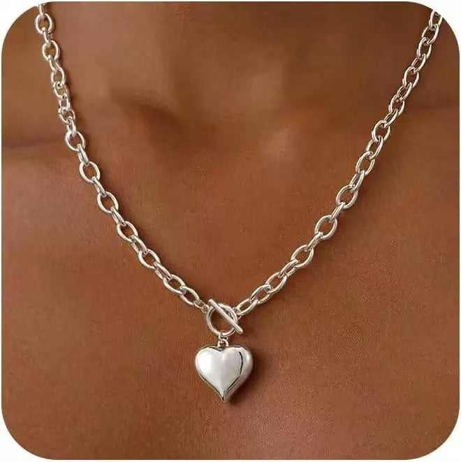 Damen Halskette mit robustem Gliederdesign und herzförmigem Anhänger Shop Nory