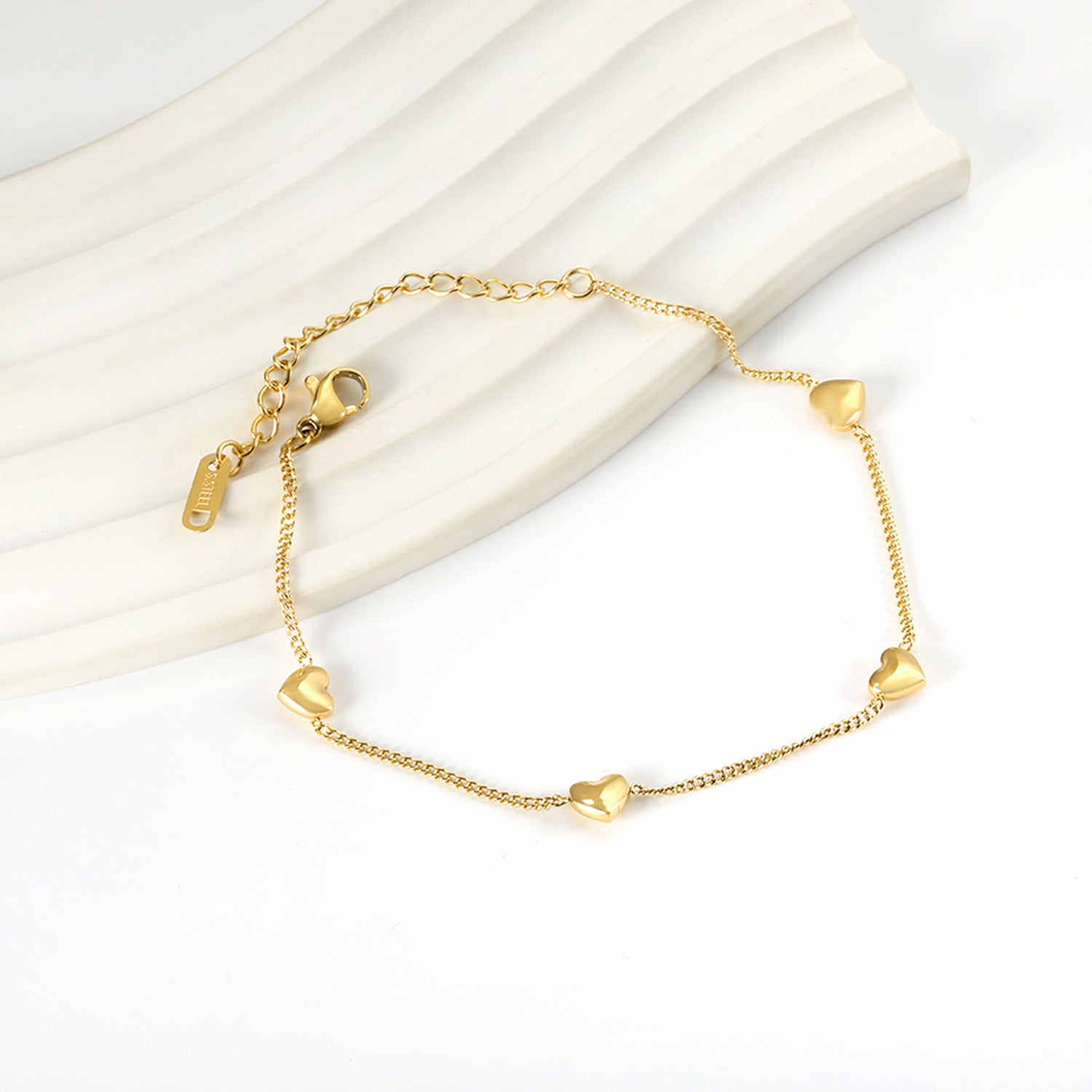 Damen Armband mit herzförmigen Anhängern und hoher allergiefreier Qualität Shop Nory