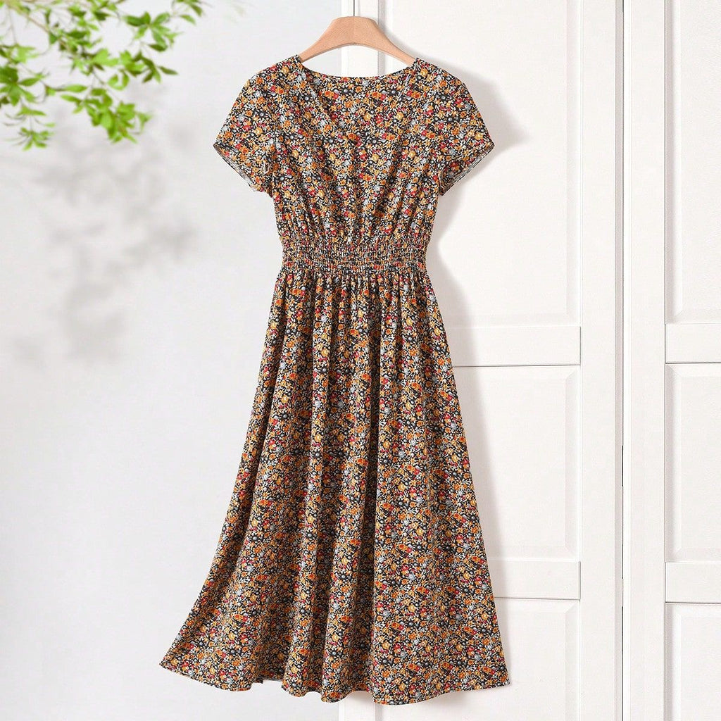 Damen Sommerliches Midikleid mit elastischem Bund und floralen Mustern