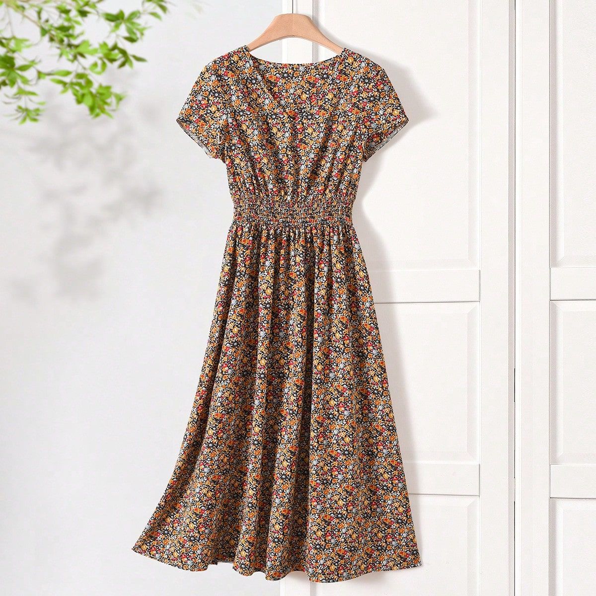 Damen Sommerliches Midikleid mit elastischem Bund und floralen Mustern