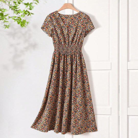 Damen Sommerliches Midikleid mit elastischem Bund und floralen Mustern