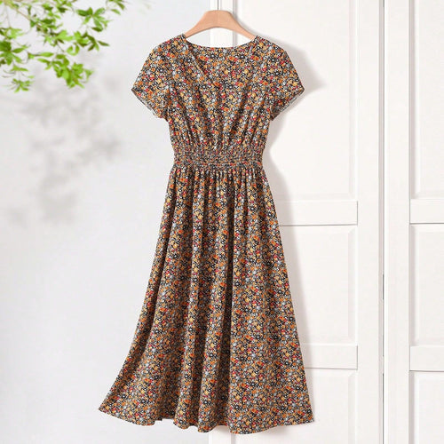 Damen Sommerliches Midikleid mit elastischem Bund und floralen Mustern