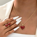 Damen Schmuckset mit herzförmigen Anhängern und goldfarbener Kette Shop Nory