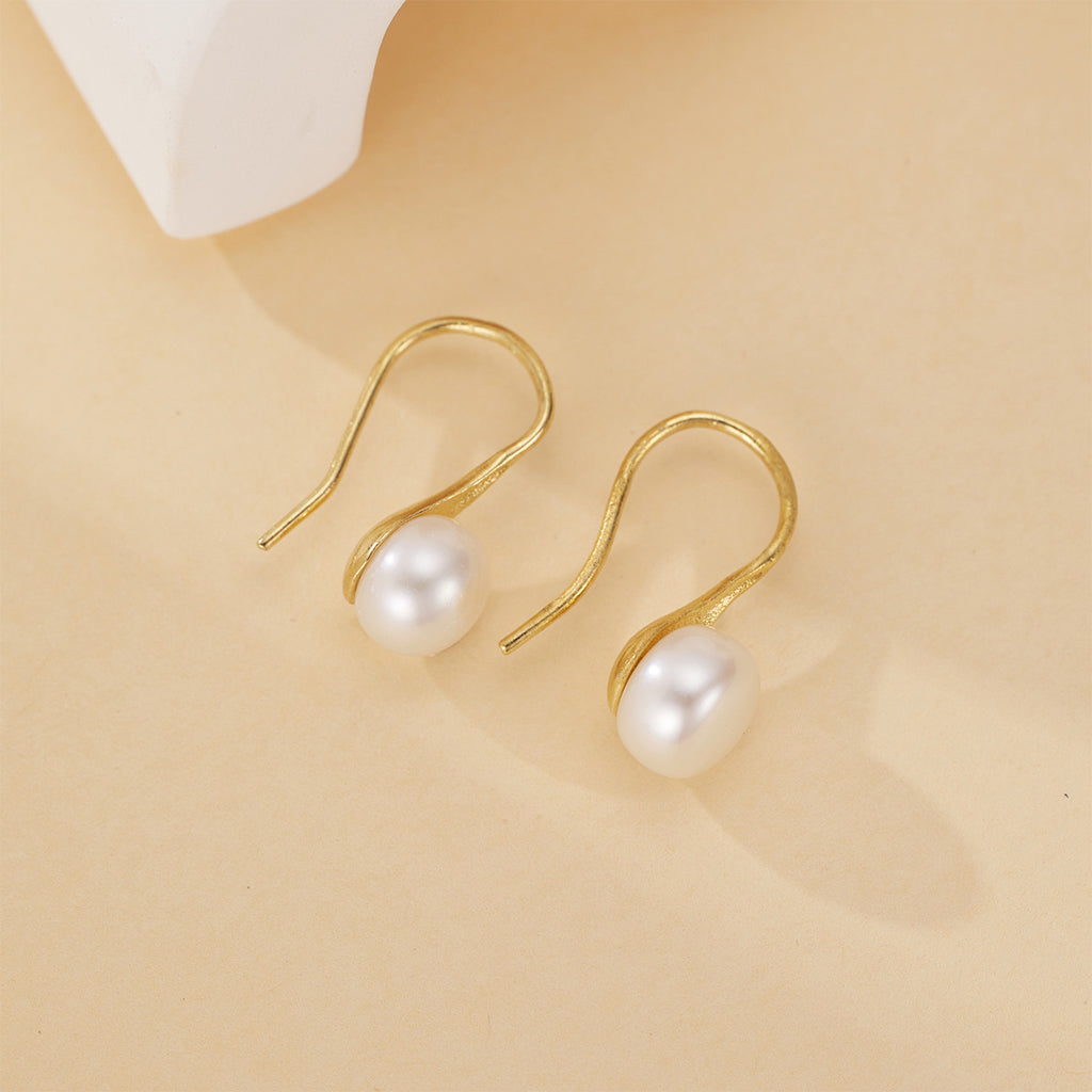 Damen elegante Ohrringe mit geschwungenem Design und echten Süßwasserperlen Shop Nory
