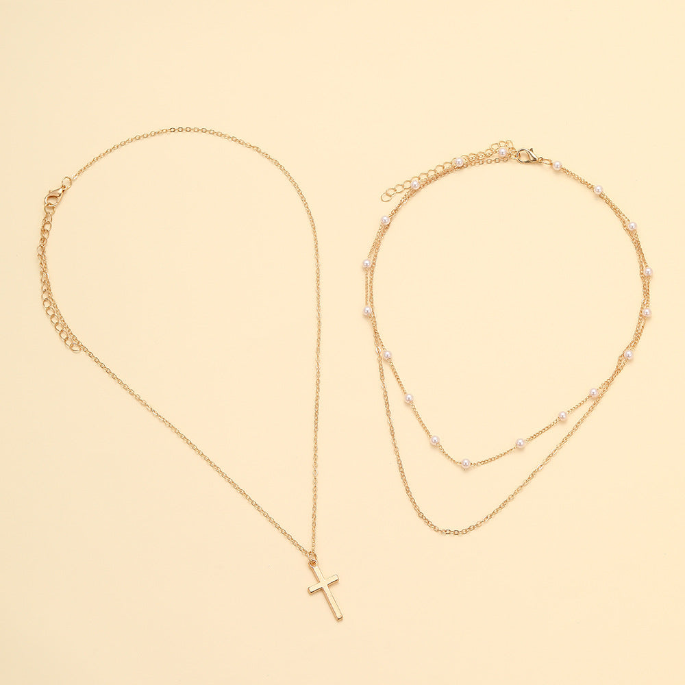Damen Halskette mit mehrlagigem Perlen- und Kreuzdesign Shop Nory