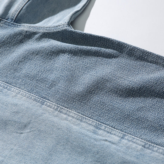 Unisex Oversize-Jeansjacke mit kontrastreichen Webpaneelen und Druckknopfverschluss Shop Nory