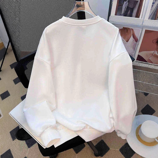 Damen nan lässiges Oversize-Sweatshirt mit gestickten Stern-Applikationen in Jeans-Optik und geripptem Saum Shop Nory