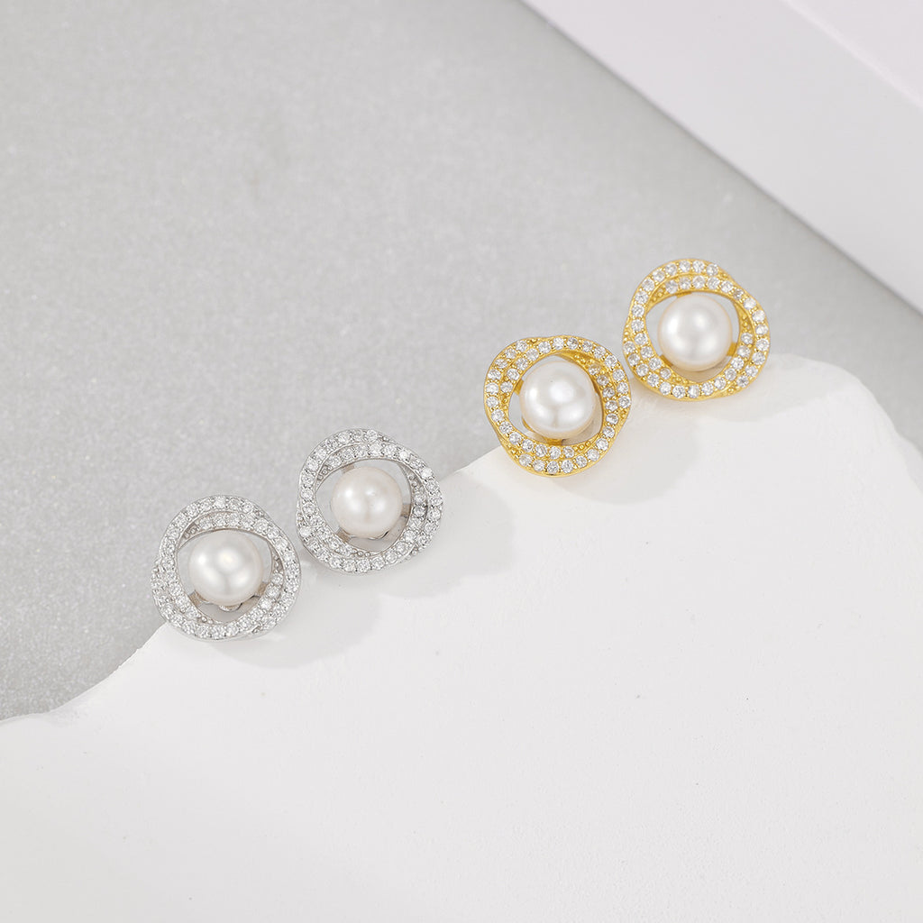 Damen Ohrstecker mit ovalem Perlenanhänger und funkelnden Zirkonia-Elementen Shop Nory