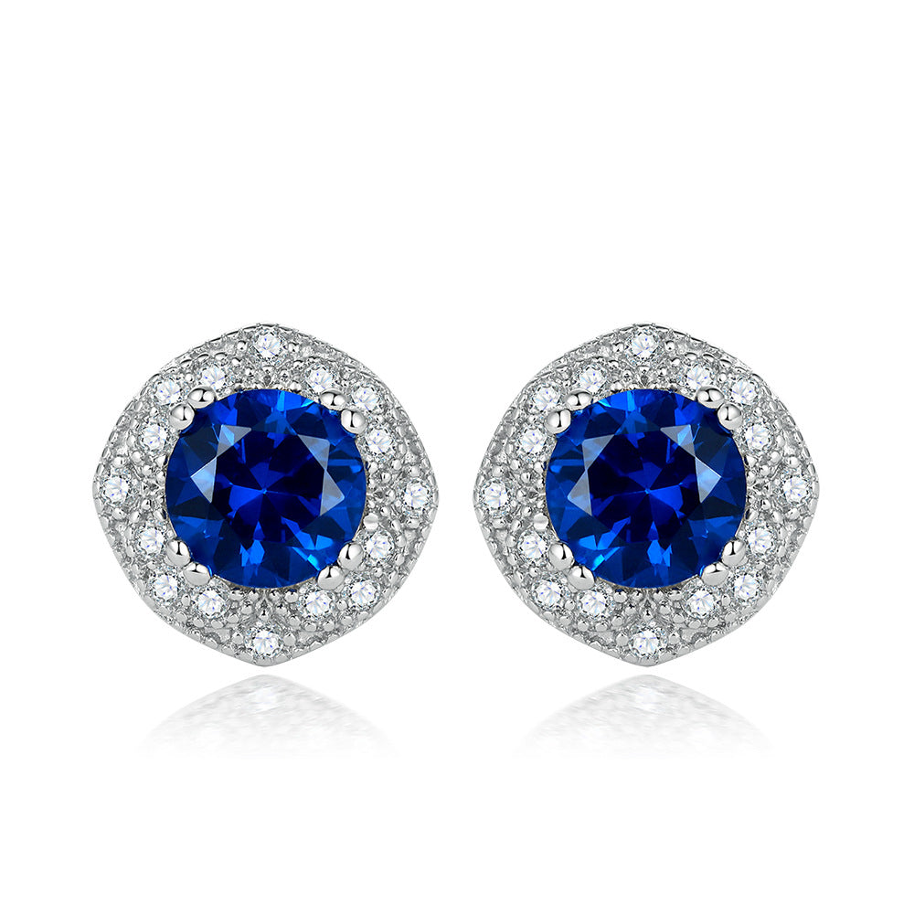 Damen Ohrstecker mit facettierten blauen Kristallen und funkelndem Zirkonia-Rahmen Shop Nory