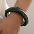 Damen moderner Armreif mit geschwungenem Design Shop Nory