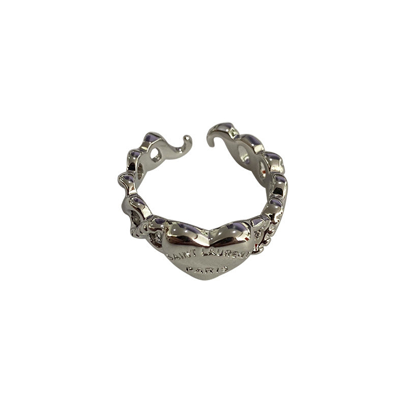 Damenring mit geschwungenem Herzen und funkelnden Details Shop Nory