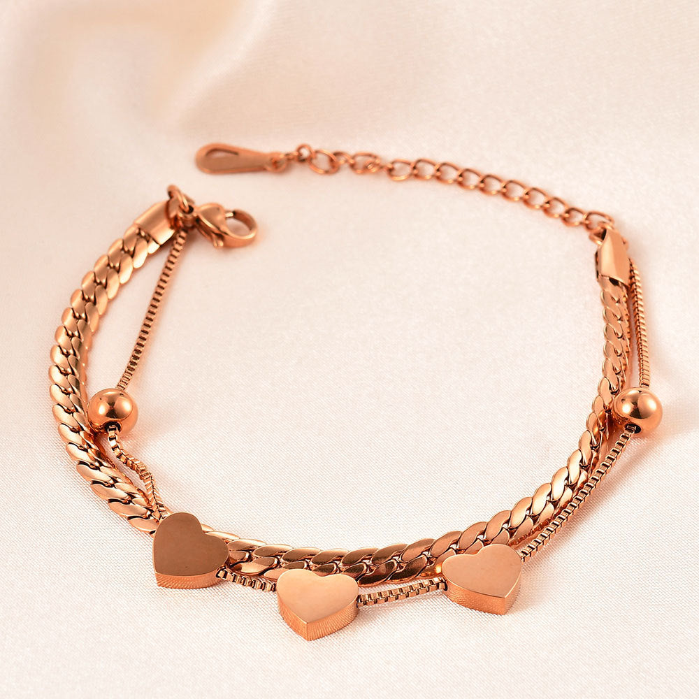 Damen Armband mit elegantem Herzdesign und feinen Kettengliedern Shop Nory