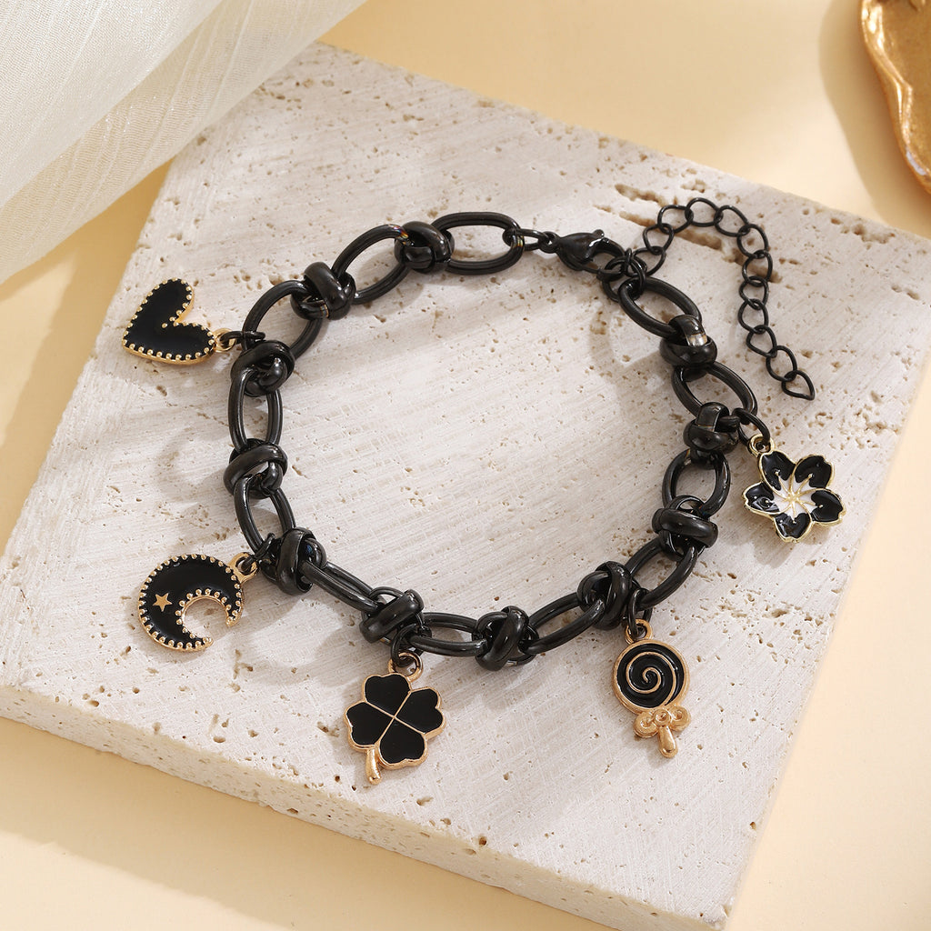 Damen Charm-Armband mit einzigartigen Anhängern Shop Nory