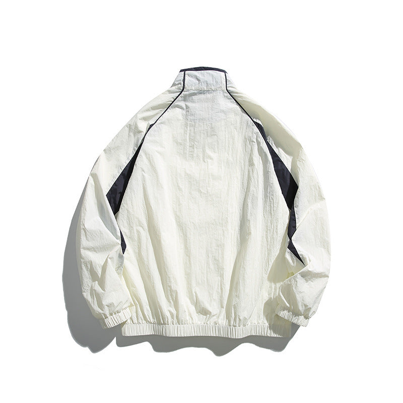 Unisex Leichte Boxy-Kapuzenjacke im Windbreaker-Stil mit Kontrastpaneelen und Raglanärmeln Shop Nory